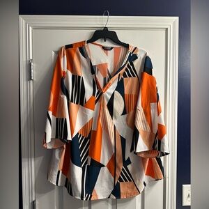 Women’s Plus Geometric Print V-Neck Blouse